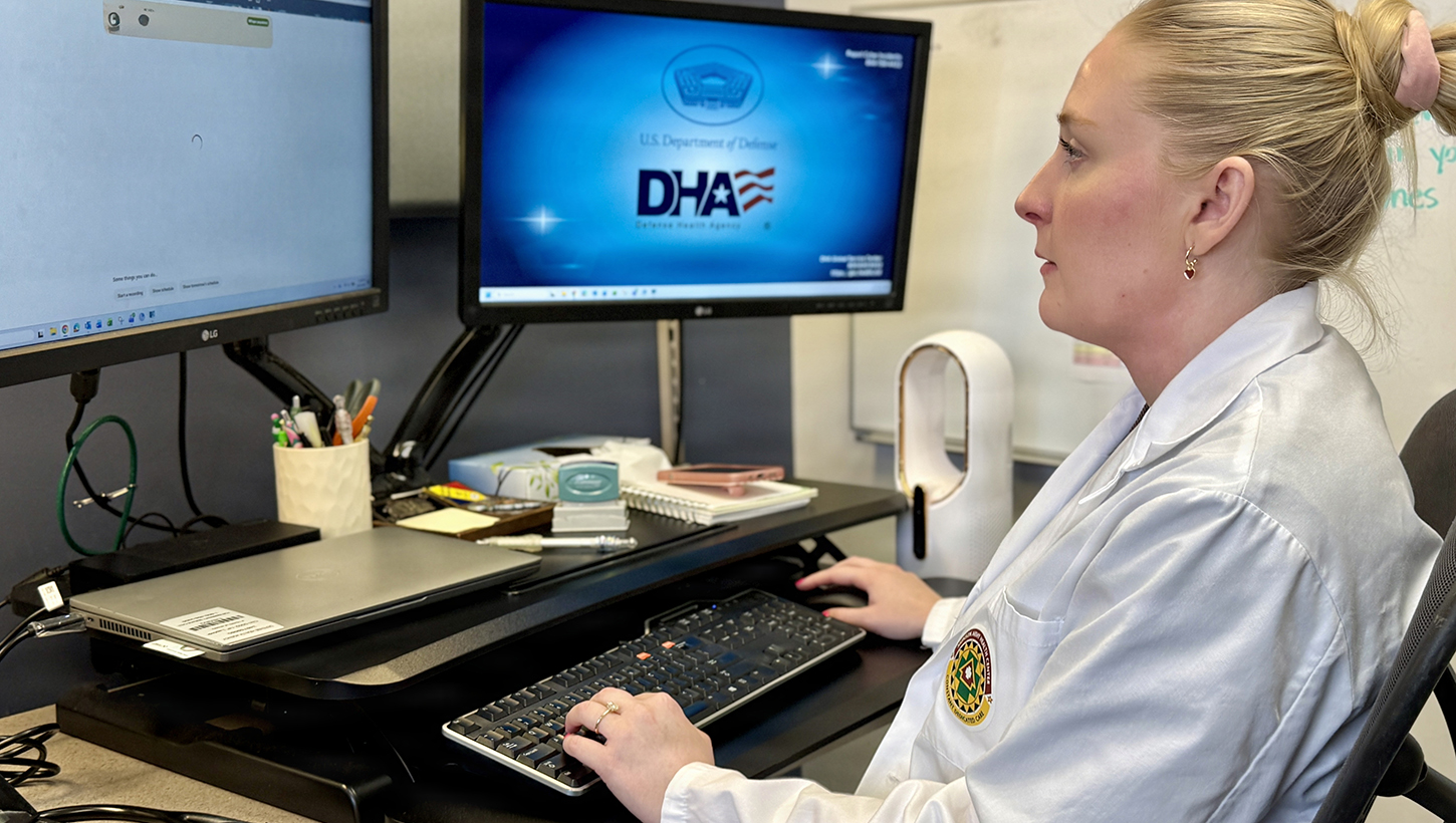Defense Health Agency Physician Assistant Mikaela Altis logs into the Ambient Listening program to review a patient record