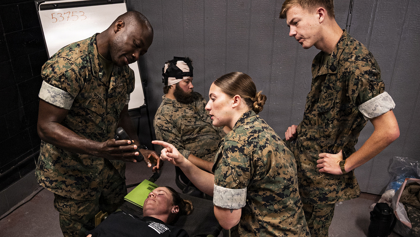 U.S. Navy corspmen and medical officers from across the II Marine Expeditionary Force get hands-on with a TBI assessment device during an end-user touchpoint