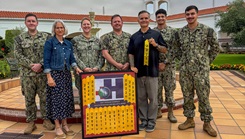 Members of U.S. Naval Hospital Rota’s Health Promotion and Wellness team display the Navy Surgeon General’s Health Promotion and Wellness Award