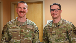 From left, U.S. Air Force Capt. Max Sarver, Luke Medical Group Operational Medical Readiness Squadron optometry element chief, and Senior Airman Wyatt Lupien, 56th Operational Medical Readiness Squadron optometry technician, pose for a portrait