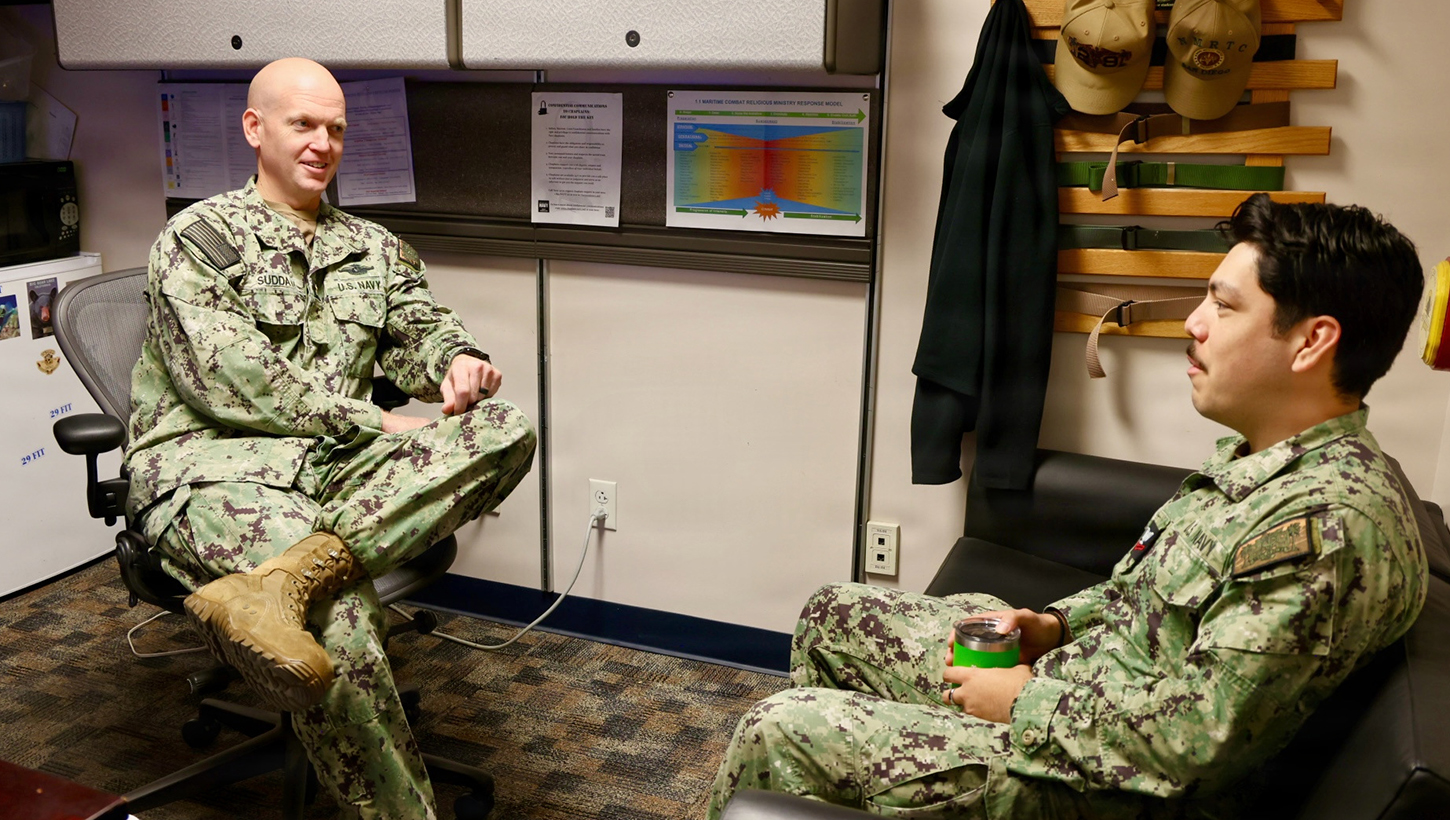 Lt. Cmdr. Nicholas Suddath (left), command chaplain, Navy Medicine Readiness and Training Command Twentynine Palms, discusses Suicide Prevention Month initiatives with Religious Program Specialist 2nd Class Diego Escalante