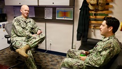Lt. Cmdr. Nicholas Suddath (left), command chaplain, Navy Medicine Readiness and Training Command Twentynine Palms, discusses Suicide Prevention Month initiatives with Religious Program Specialist 2nd Class Diego Escalante