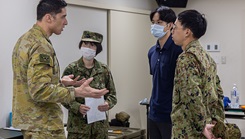  U.S. Army Soldiers assigned to the 456th Medical Operations Readiness Unit out of Iowa, 1st (Australian) Division Soldiers, and the Japan Ground Self-Defense Force (JGSDF) medical personnel work alongside each other to provide medical support during Yama Sakura 89 on Camp Itami, Japan, Aug. 31st, 2025.