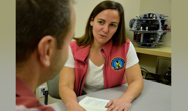 Occupational therapist Kathryn Ellis meets with a patient at Walter Reed National Military Medical Center in Bethesda, Maryland. (Courtesy photo)