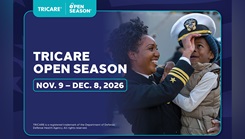 Military personnel with a banner saying "TRICARE Open Season" 