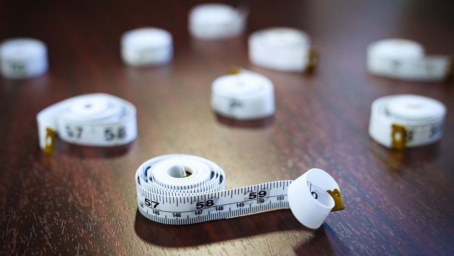 Tape measures lie on a table