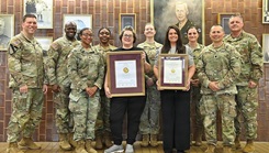 Pictured from left are Col. Patrick W. Miller, hospital commander; Lt. Col. Riliwan Ottun, deputy commander of administration; Lt. Col. Ashley Cesar, deputy commander of clinical services; Ria Moore, Joint Commission coordinator; Crystal Langston, primary care supervisory nurse; Col. Idongesit Ebeute, deputy commander of nursing; Col. Suzanne Jones, deputy commander of dental services; Capt. Debra Jones, M.D., chief of the emergency department; and Lt. Col. Ralph Salazar, deputy commander of quality and safety.