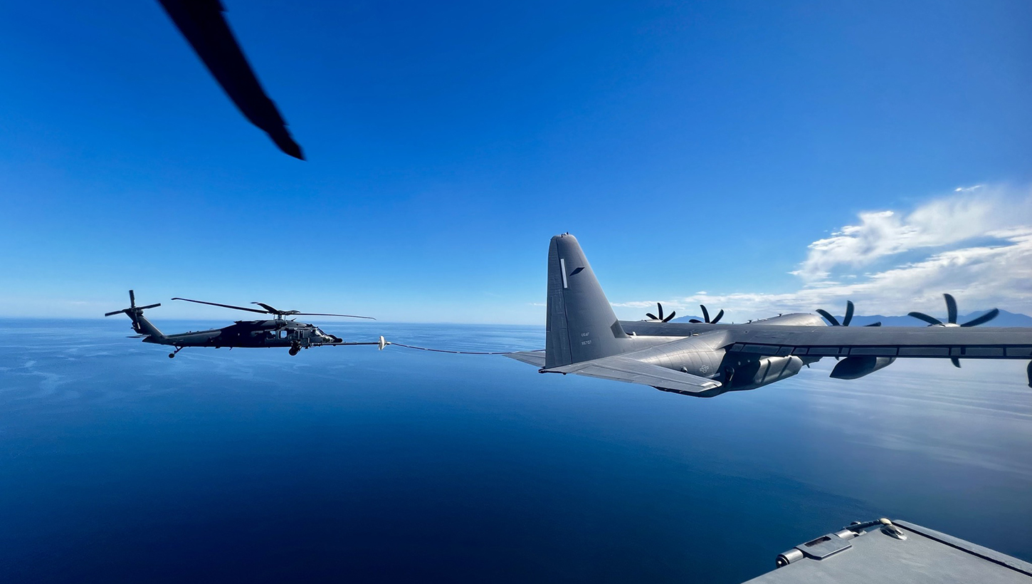 U.S. Air Force aircraft from the 563rd Rescue Group perform air-to-air refueling during a rescue mission