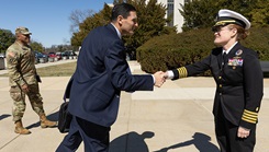 U.S. Navy Capt. Melissa Austin, Director of Walter Reed National Military Medical Center, greets Mr. Darin Selnick, Performing the Duties of the Under Secretary of Defense for Personnel and Readiness, during an official visit to the medical center in Bethesda, Md.