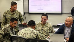 Representatives from the Joint Operational Medicine Information Systems (JOMIS) Program Office and various fleet commands discuss critical tasks during the Naval Training Systems Plan workshop in San Diego.