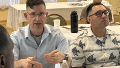 U.S. Army Col. Jimmy Watts speaking during a meeting