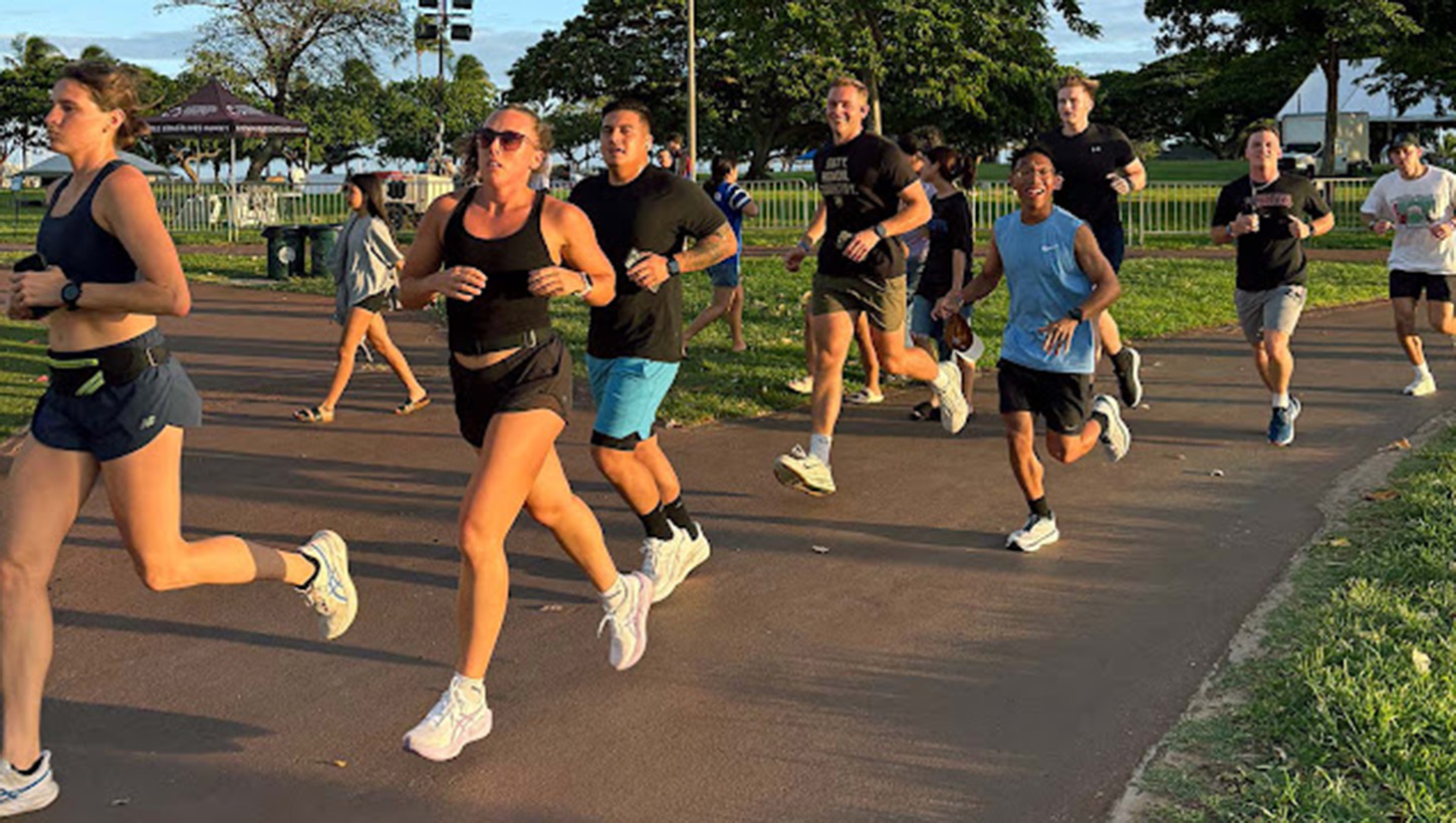 Photo of USU students running