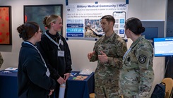 Dr. James “Austin” Cox, Uniformed Services University’s Assistant Dean for Recruitment, speaks with prospective students about the Military Medical Community (MMC) initiative