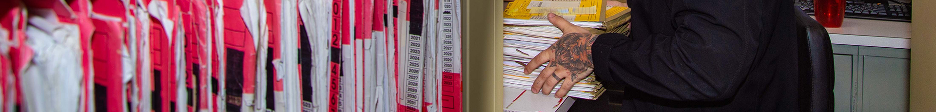 WEST MEDITERAINIAN SEA (May 4, 2022) Hospitalman Ramon Bacchus, from New York, organizes medical records aboard the Nimitz-class aircraft carrier USS Harry S. Truman (CVN 75), May 4, 2022. The Harry S. Truman Carrier Strike Group is on a scheduled deployment in the U.S. Sixth Fleet area of operations in support of U.S., allied and partner interests in Europe and Africa. (U.S. Navy photo by Mass Communication Specialist Seaman Charles Blaine)