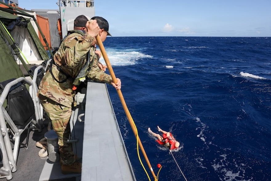 U.S. Soldiers assigned to the 8th Forward Resuscitative Surgical Detachment, 18th Theater Medical Command, conduct casualty evacuation training aboard the Maneuver Support Vessel (Light) SSG Elroy F. Wells off the coast of Oahu, Hawaii
